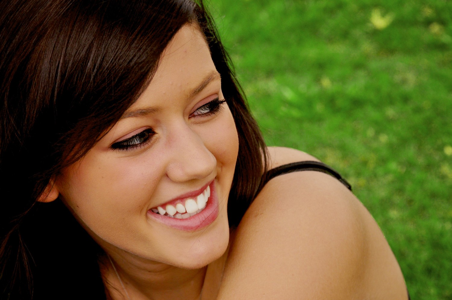 Candid portrait in the grass
