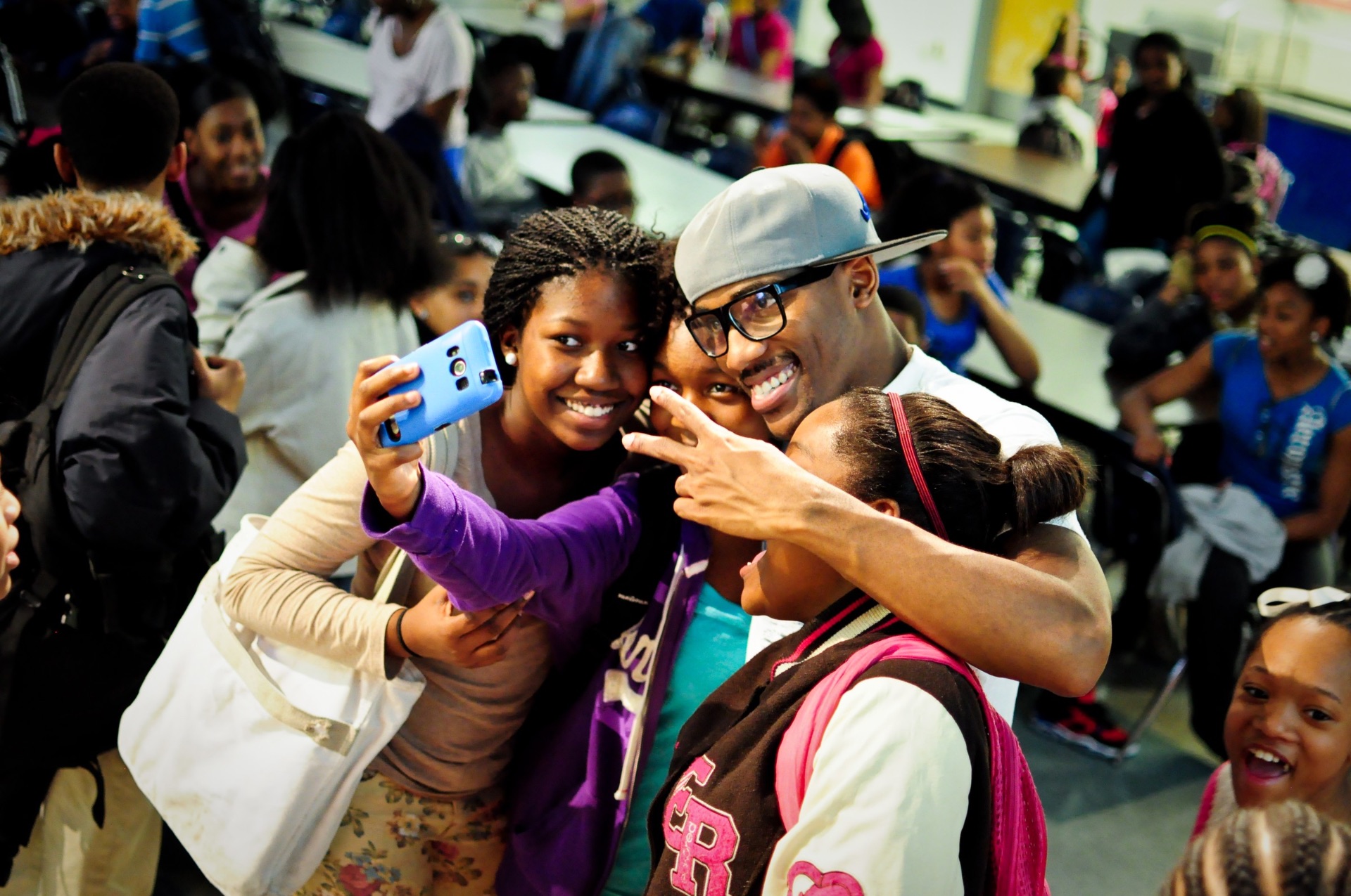Friends taking a selfie at a community event